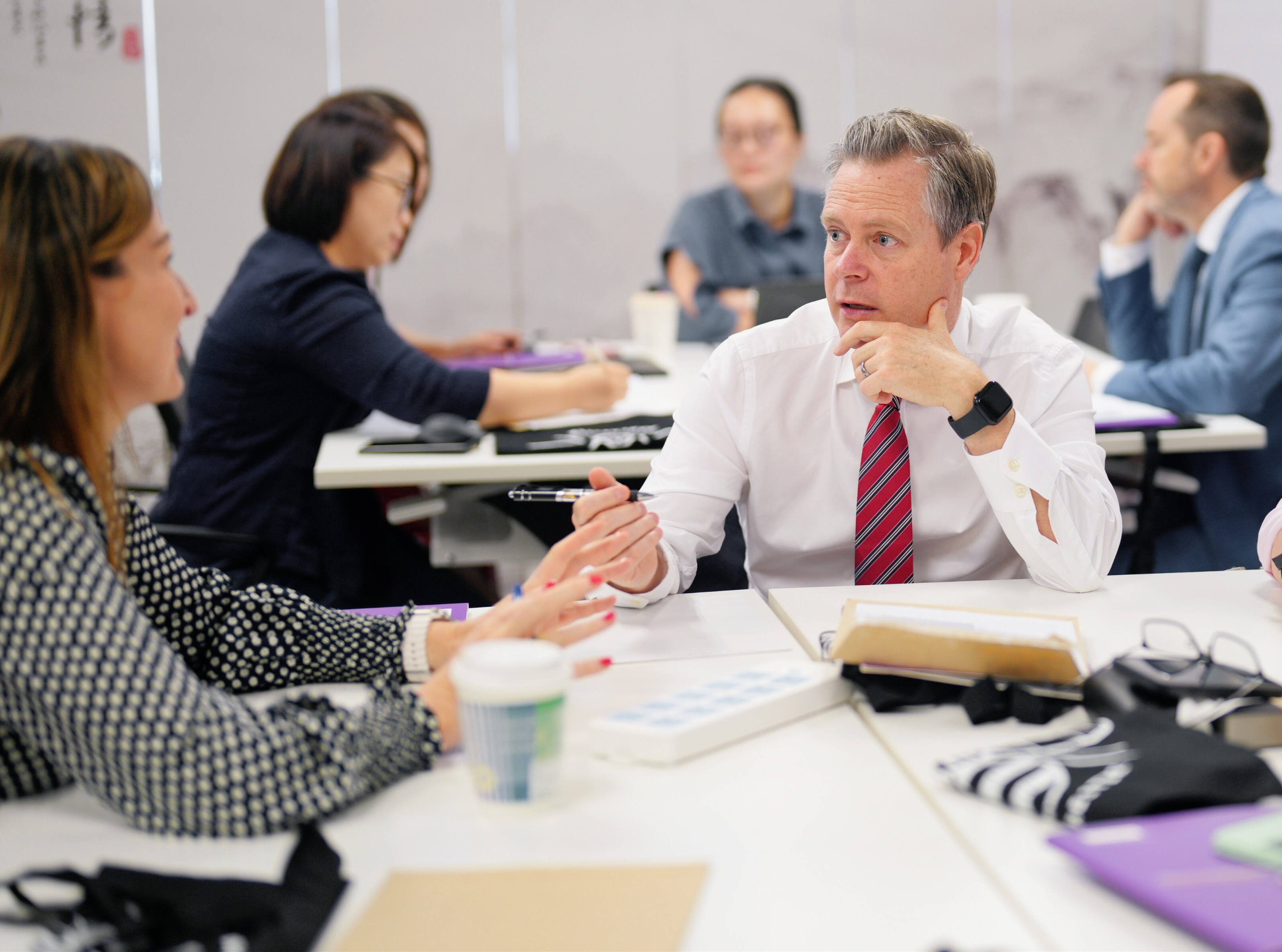 As part of The Bridge | China initiative by Wellington College China that promotes international education partnership, groups of teachers from different international schools sit around tables to collaborate and drive innovative education programmes